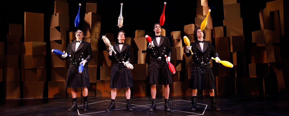 Four Karamazov brothers juggling bowling pins